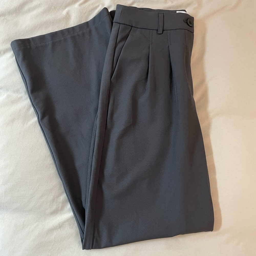 Grey high-waisted pleated trousers
